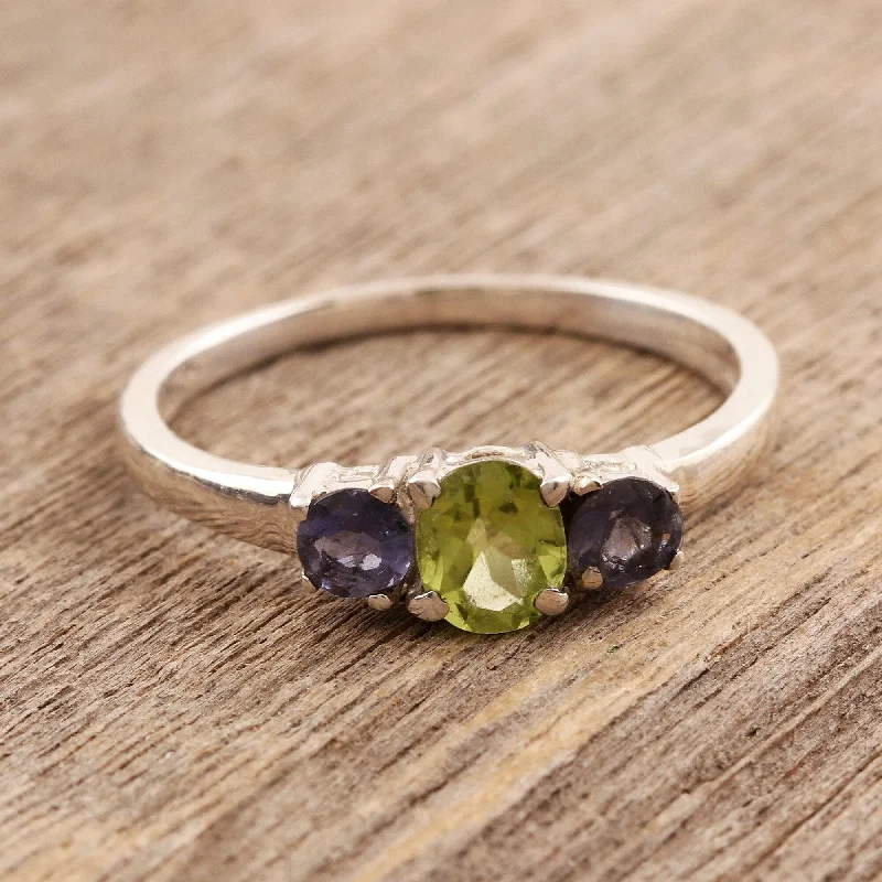 Shiny platinum ring-Blue Embrace' Iolite and Peridot 3-stone Ring