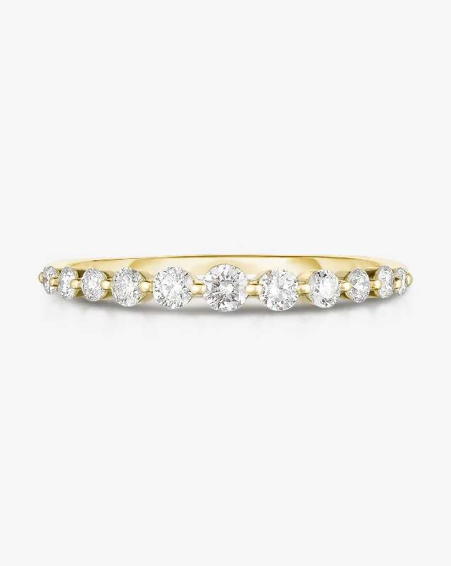 Dense gold ring-Graduated Single Prong Diamond Ring