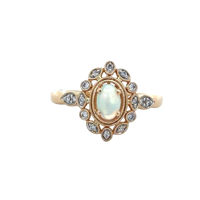 Mottled gem ring-Opal and Diamond Ring in Yellow Gold