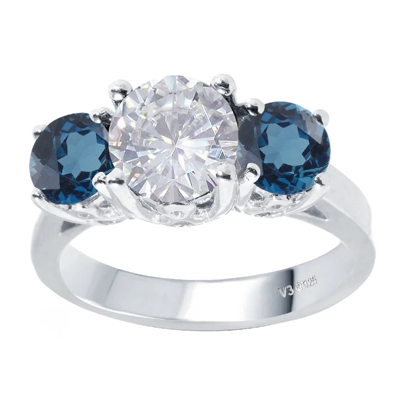 Cosmic burst ring-Sterling Silver with Moissanite and London Blue Topaz Three-Stone Ring